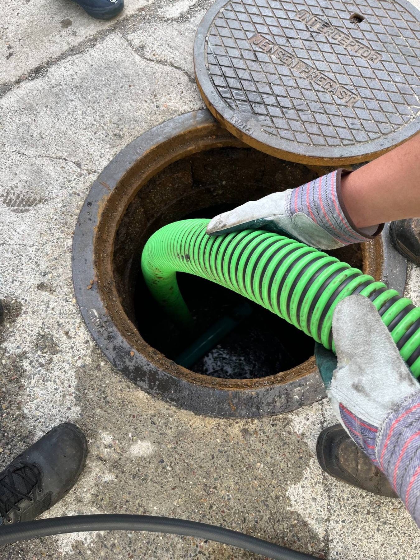 Grease trap cleaning service technician