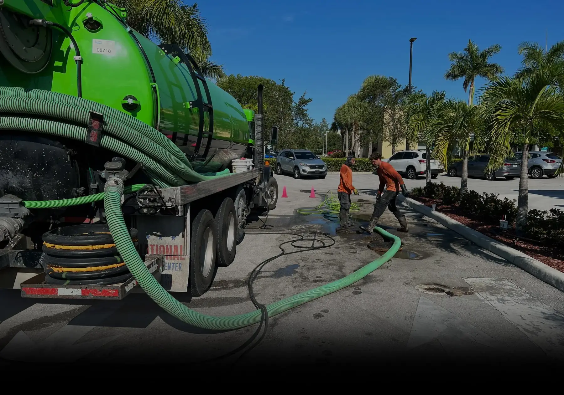 Technician performing grease trap service